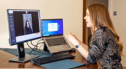 Emily Quinn speaks to her mentee in a video call