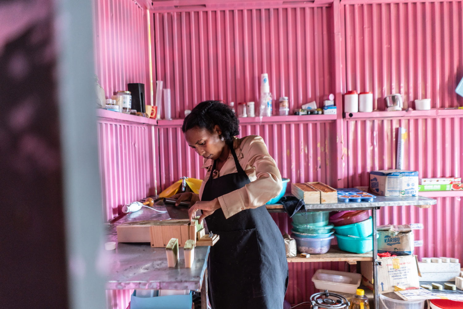 Wangari Mwaura is in the process of making organic soaps in her small workshop in Kenol town, Kenya, on Wednesday, Sep. 30, 2020. Wangari Mwaura is using HerVenture, a busines skills training mobile app created by the Cherie Blair Foundation for Women. The app features seven learning ‘tracks’ on a range of needs, including launching a business, product innovation and expanding market access, and a new track focusing on e-commerce