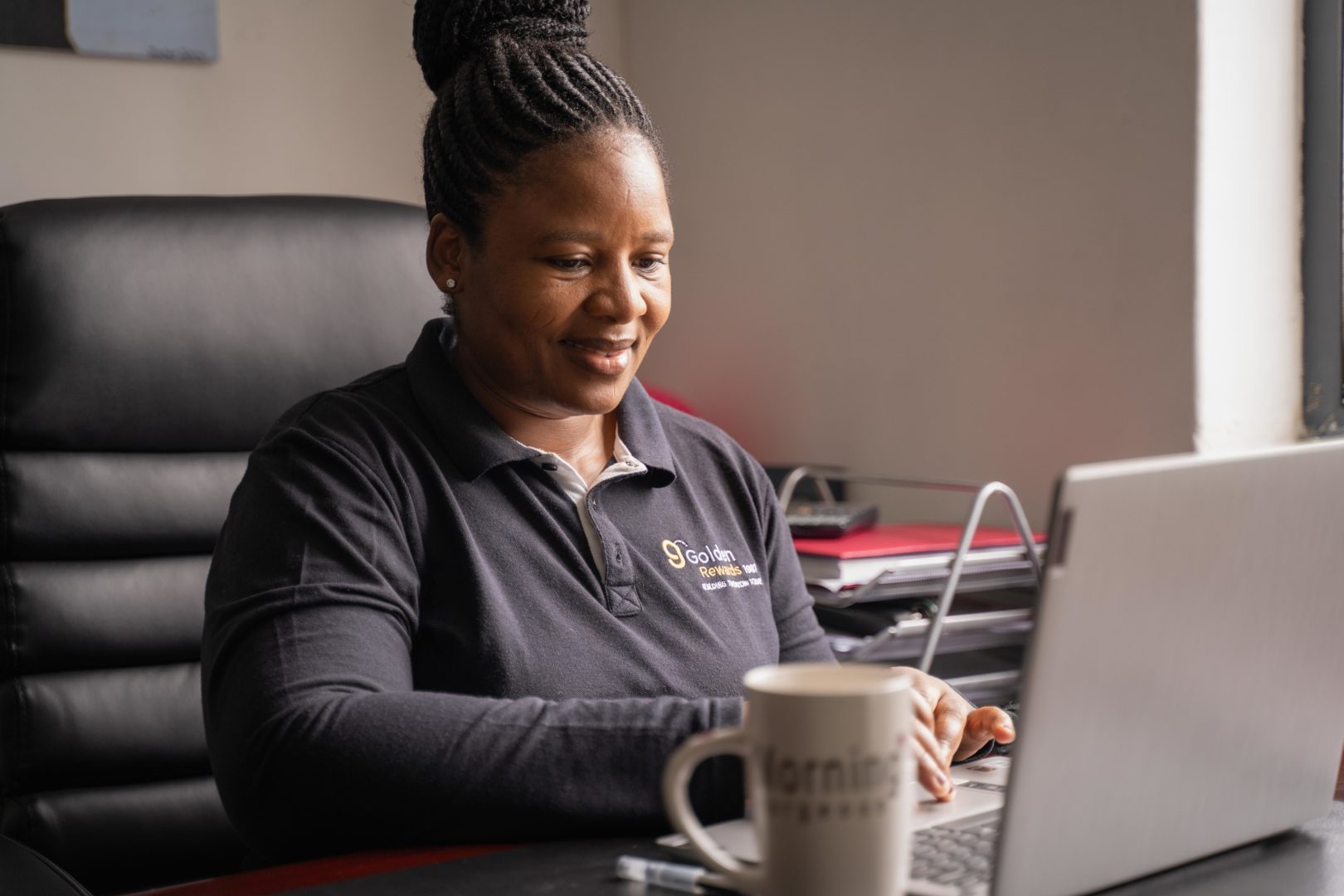 Mampho Sotshongaye, founder and managing director of Golden Rewards 1981, sits at her office desk in Cape Town, South Africa, on 28 February 2022. The Cherie Blair Foundation for Women continues to help release the potential of women entrepreneurs in low and middle income countries and close the global gender gap in entrepreneurship.