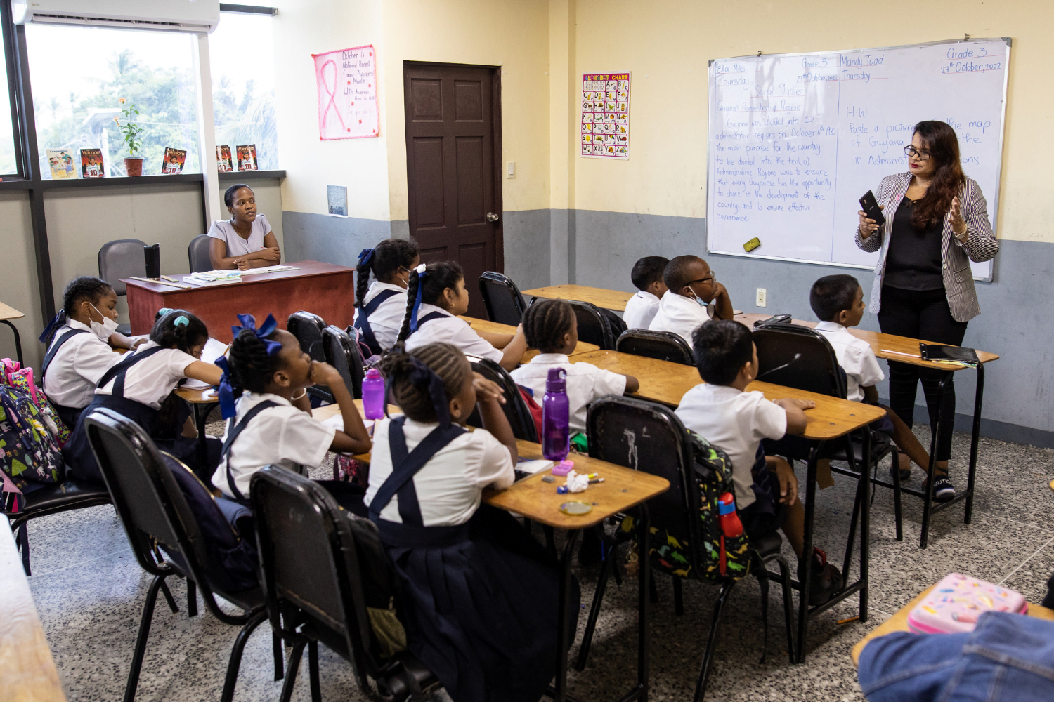 Camille Deokie, Founder and CEO of Camille’s Academy, and HerVenture user speaks to students at her school