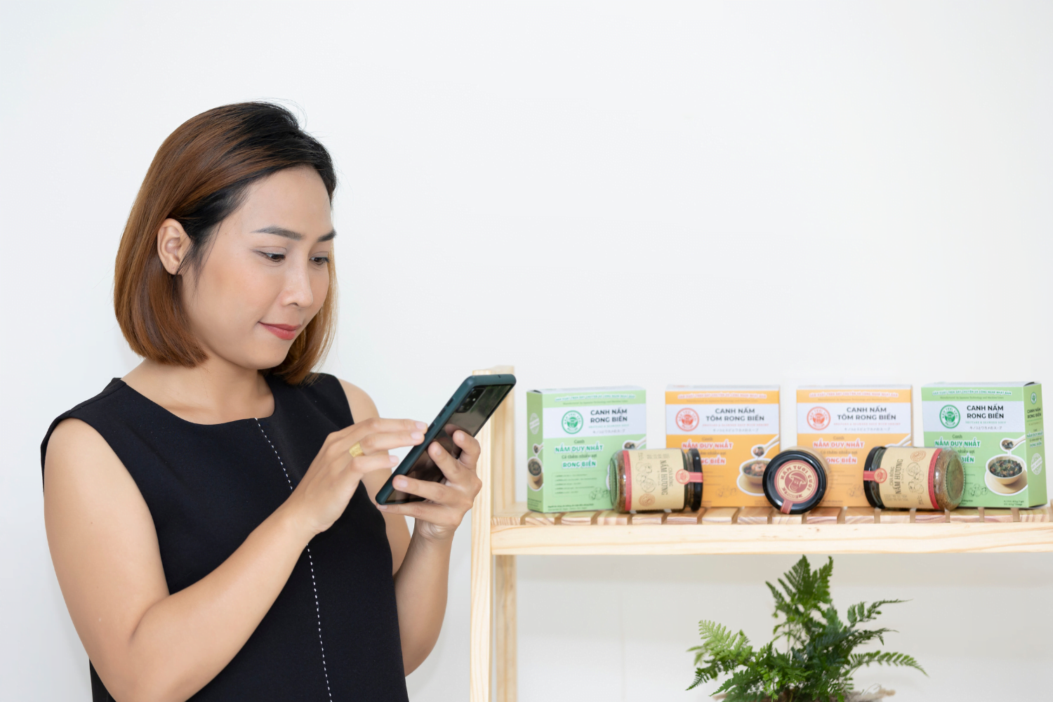 Van Pham uses the HerVenture app at her business in Vietnam