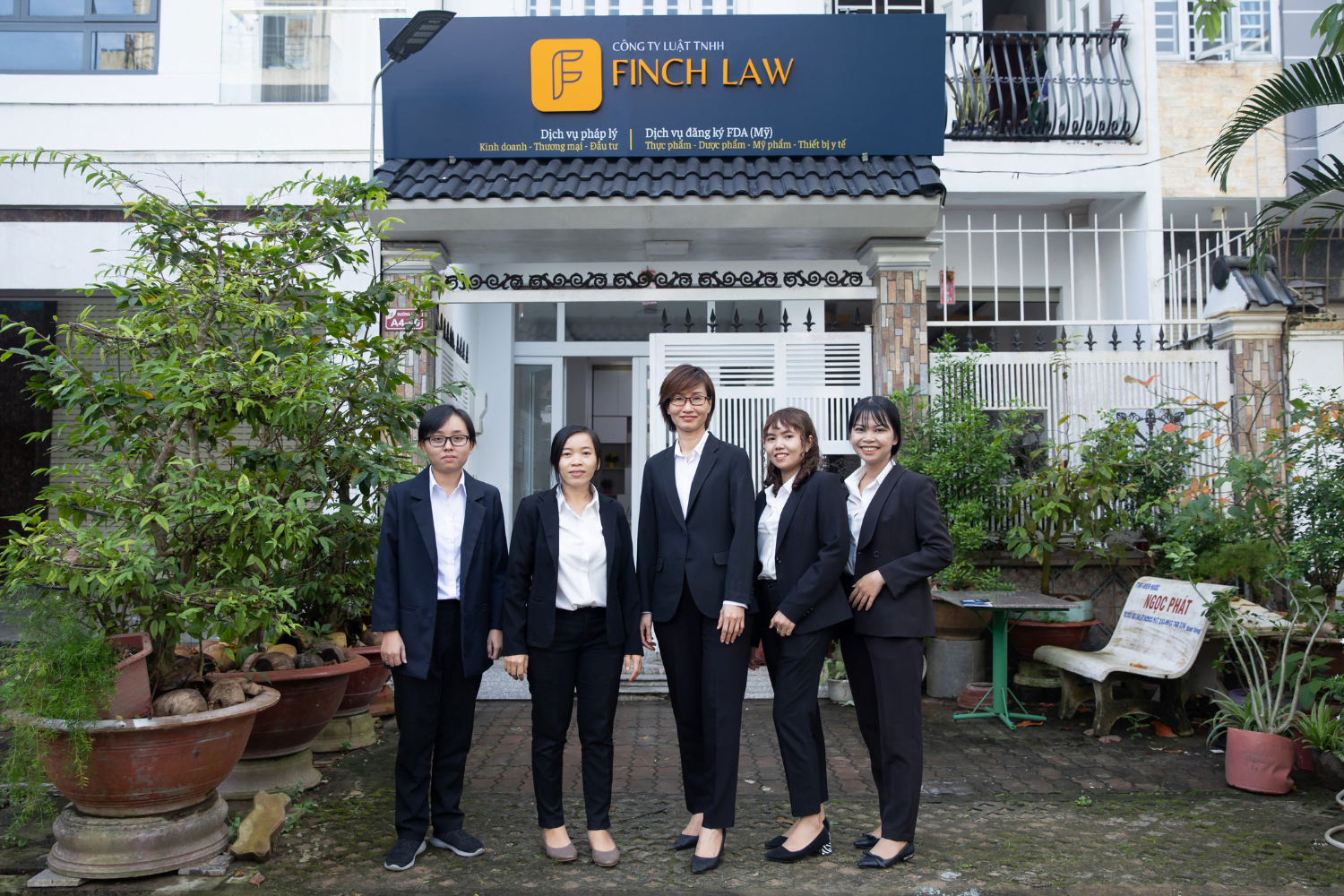 Mai Thi Le Quyen poses outside of Finch Law in Vietnam