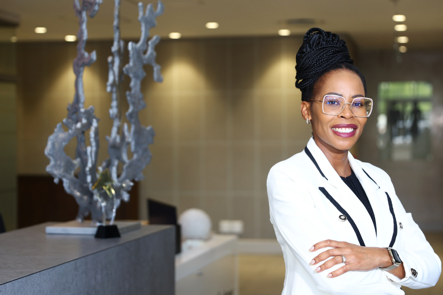 Queen Mokulubete, Founder of Somila Engineering, poses at her office.