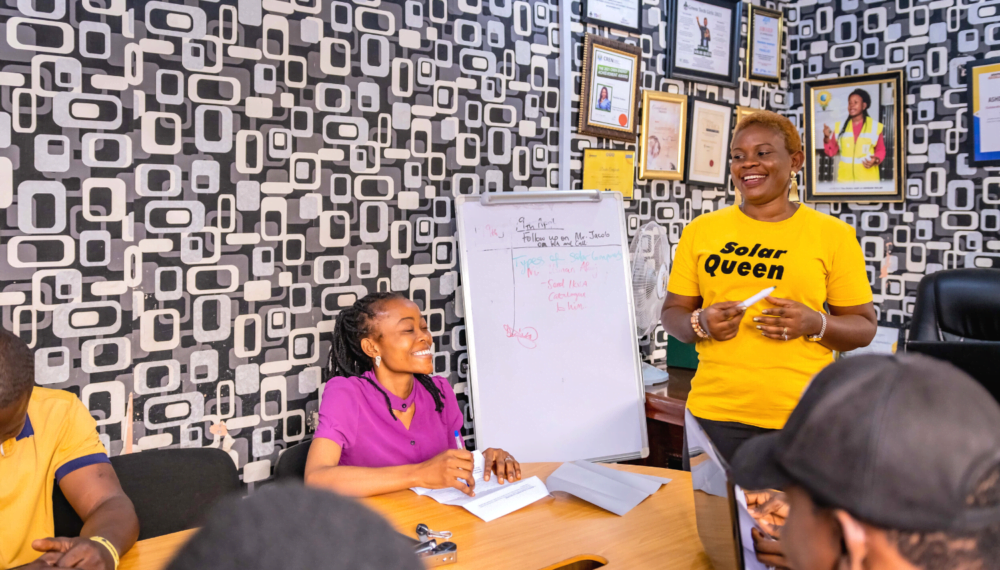 Damilola Asaleye leads a meeting at Ashdam Solar Company office