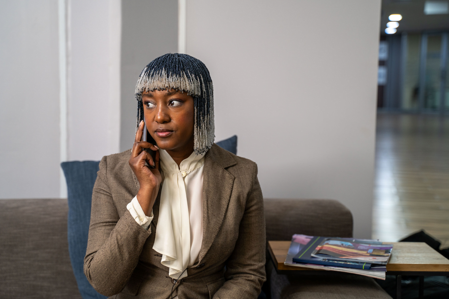 Kea Modise-Moloto, Founder of Arise in Johannesburg, South Africa, speaks on the phone.