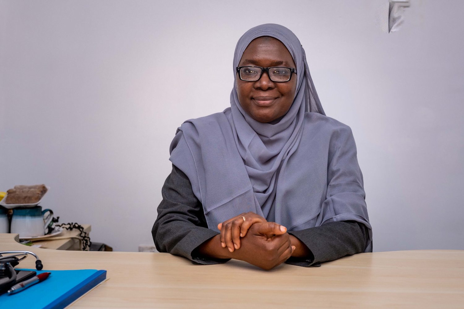 Dr. Hajara Yusuf at her desk