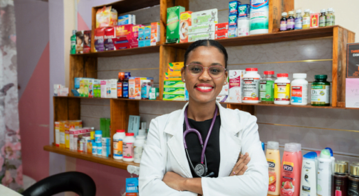 Dr. Hollina Alfred poses for a photograph behind the counter in Holli Care, in Albouystown, Georgetown, Guyana. 24 June 2024.
