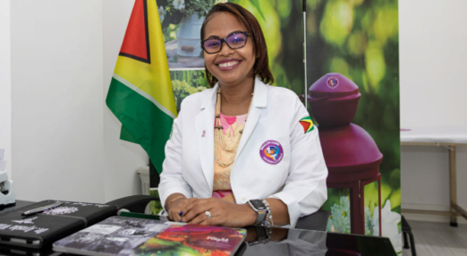 Dr. Ayesha Wilburg does desk work at her clinic in Guyana